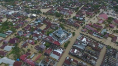 Indonesia’s Sumatra island flooded, forcing thousands to flee homes