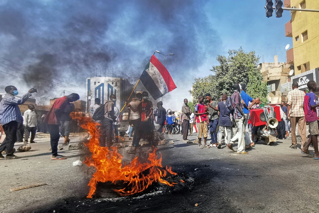 Sudan security forces fire tear gas as thousands protest coup