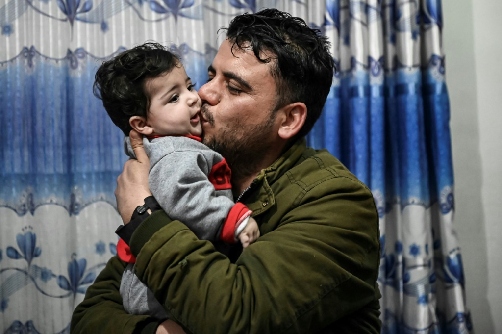 Afghan baby lost in US airlift chaos reunited with family