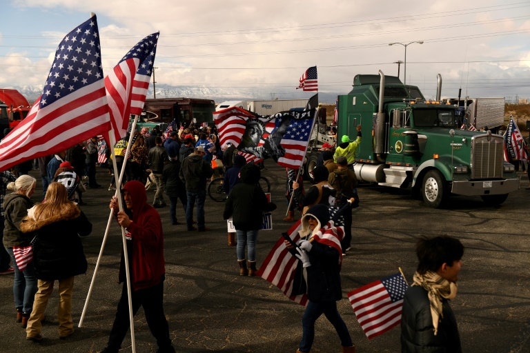 US truckers launch ‘People’s Convoy’ in pandemic protest