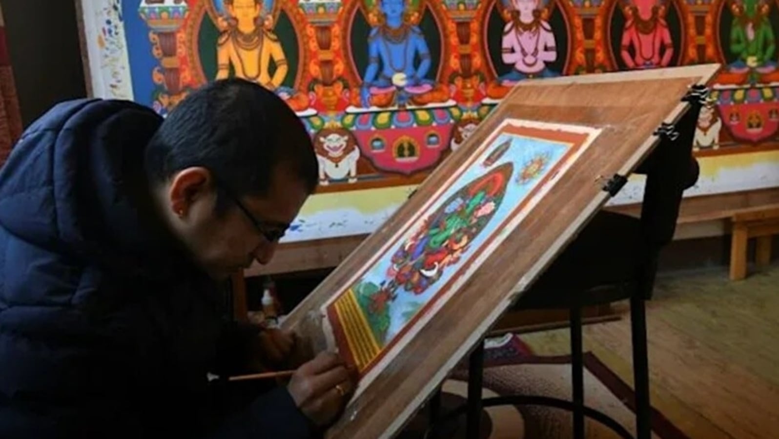 Nepal artist breathes life into sacred painting tradition