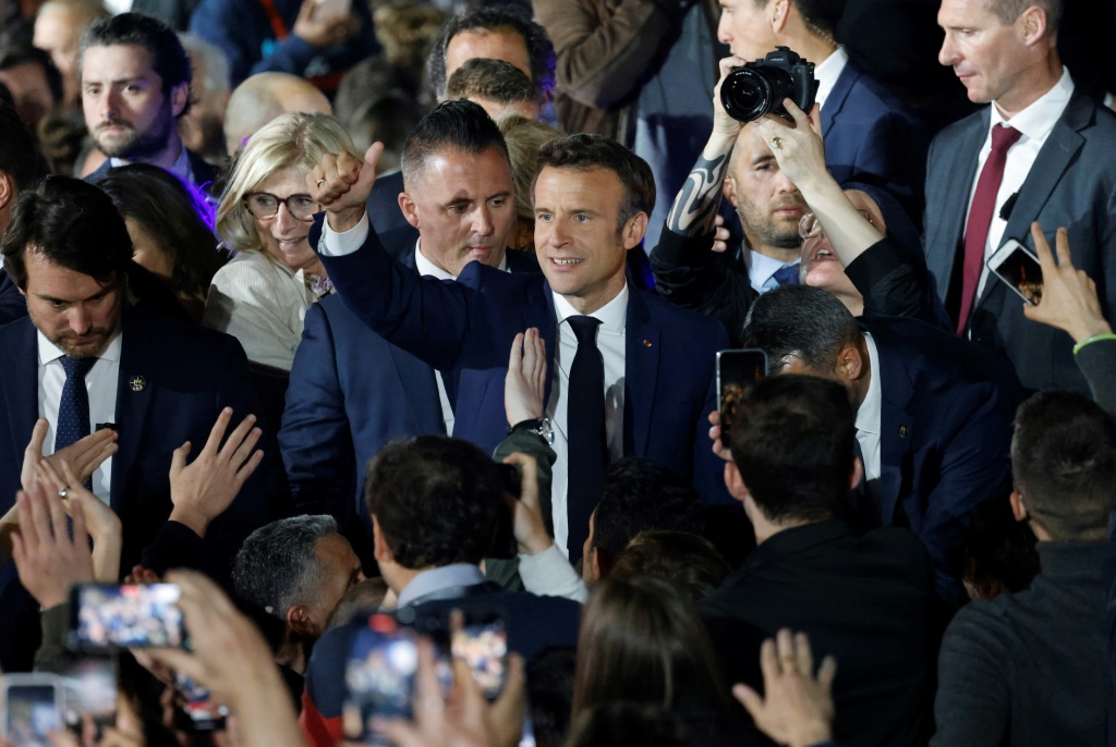 Relief, not joy, at low-key Macron election party