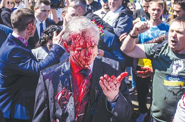 Russian envoy to Poland splattered with red liquid on Victory Day