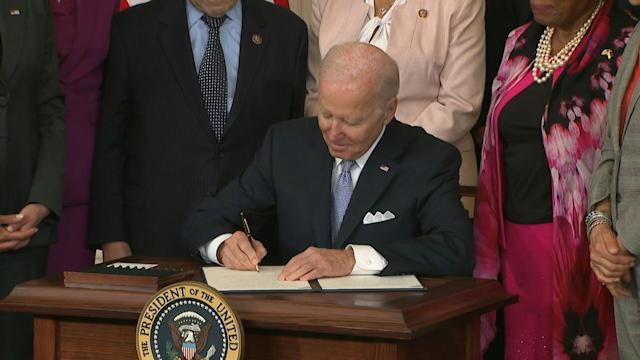 Biden signs police reform order two years after Floyd murder