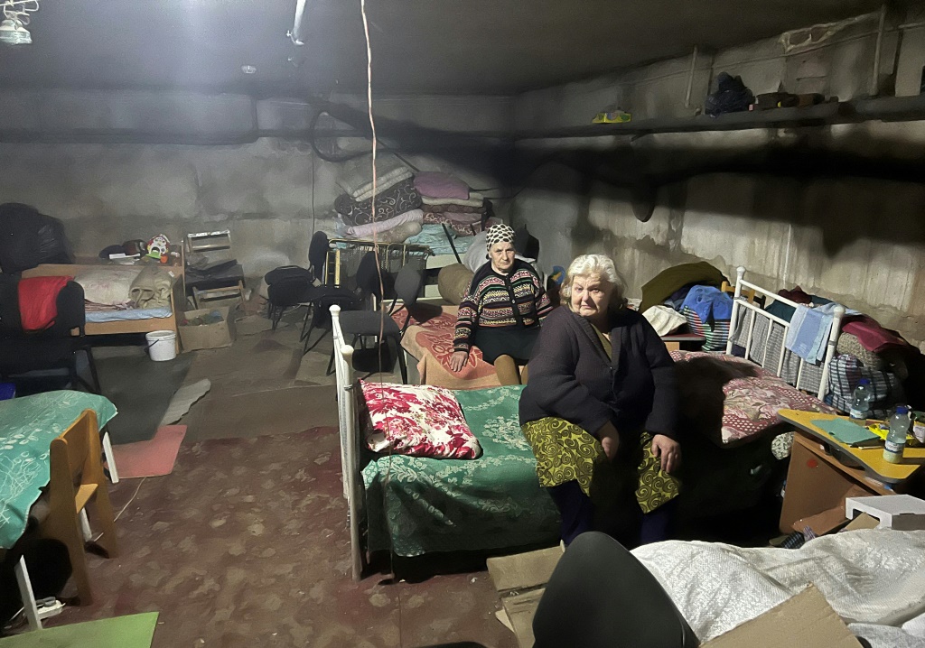 Ukraine shelter residents mark each day alive with a red cross