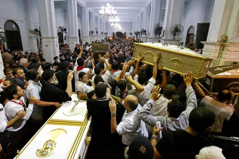 Egyptians mourn 41 killed in Cairo Coptic church fire