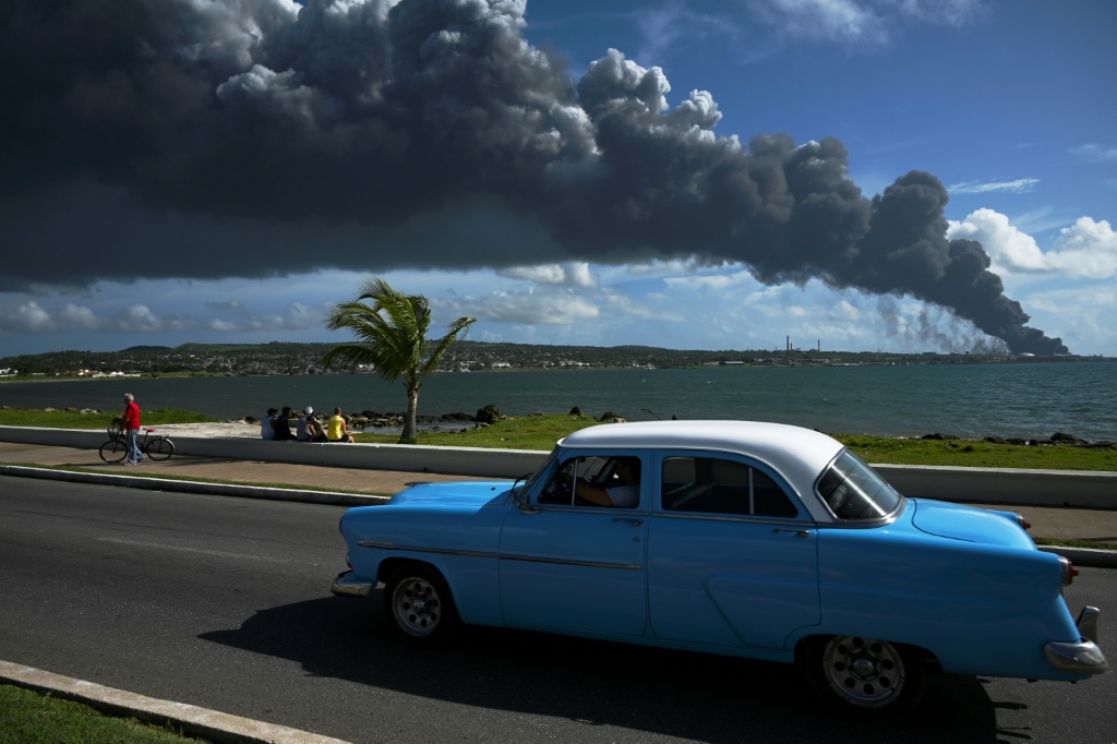 Cuba seeks help to contain depot fire that has killed at least one, injured dozens