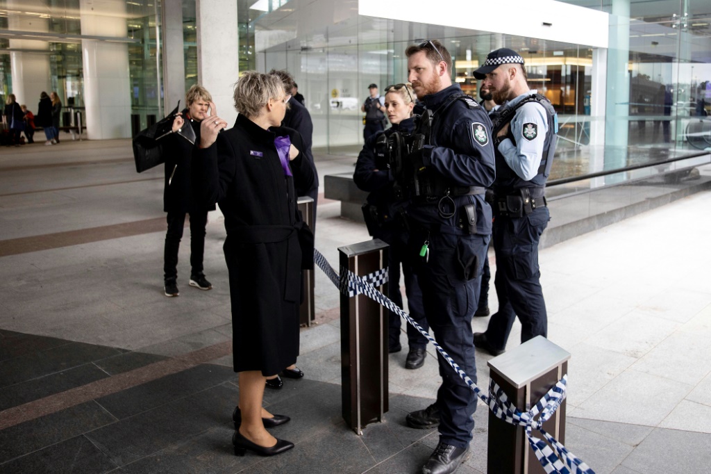 Gunman detained after firing shots in Canberra airport