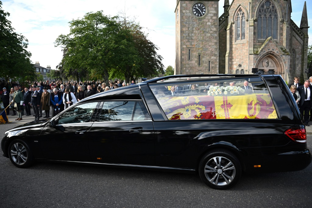 Queen Elizabeth II embarks on solemn final journey