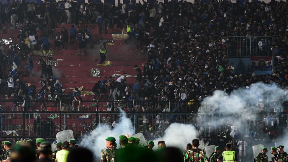 Flowers laid outside Indonesian stadium after football stampede