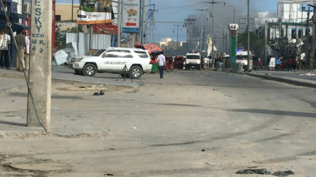 Smoke billows as two blasts target Somalia Education Ministry