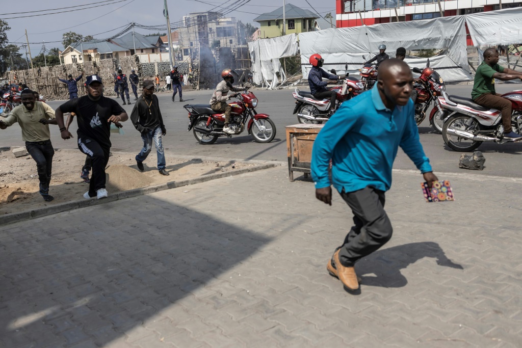 Police crack down on protest against east DR Congo force