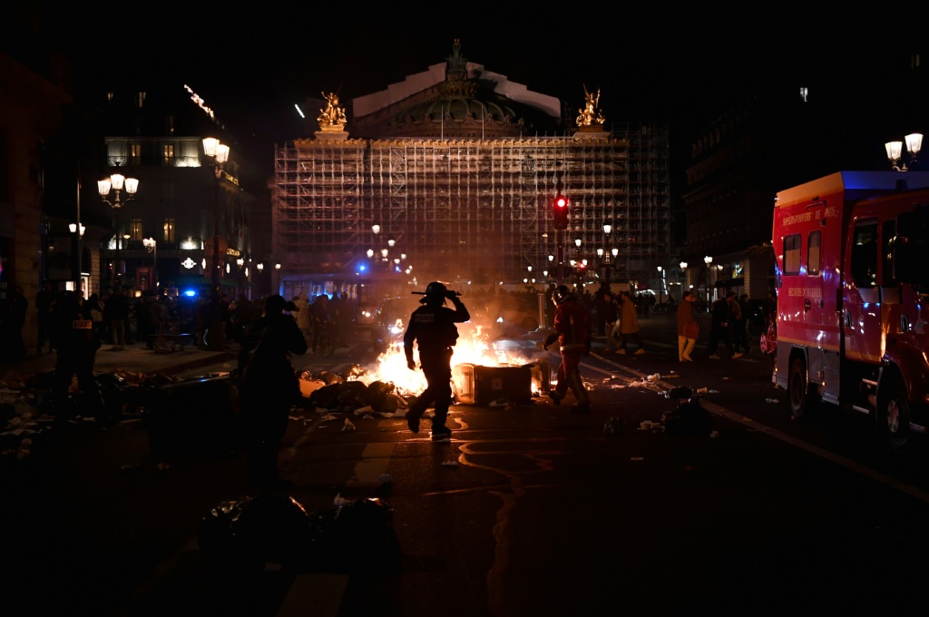 Macron to speak as anger smoulders over pension reform