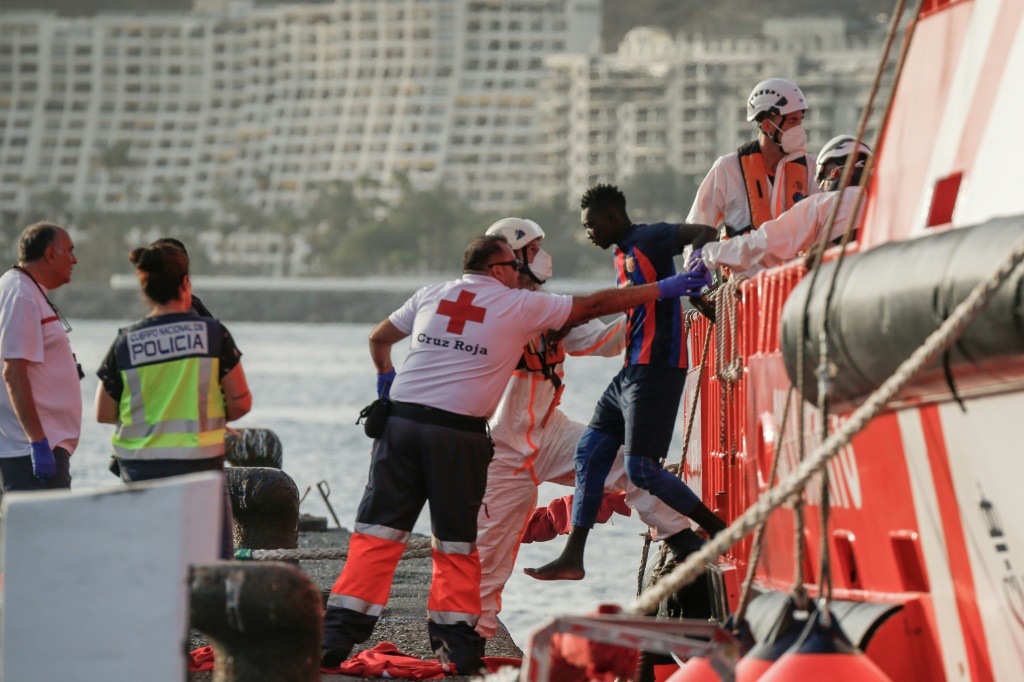 Rescuers save 86 migrants from boat near Canary Isles