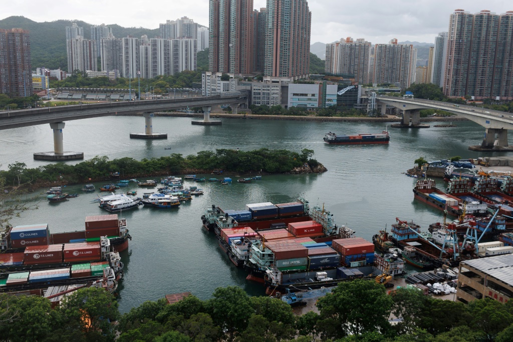 Thousands evacuated as typhoon nears southern China, Vietnam