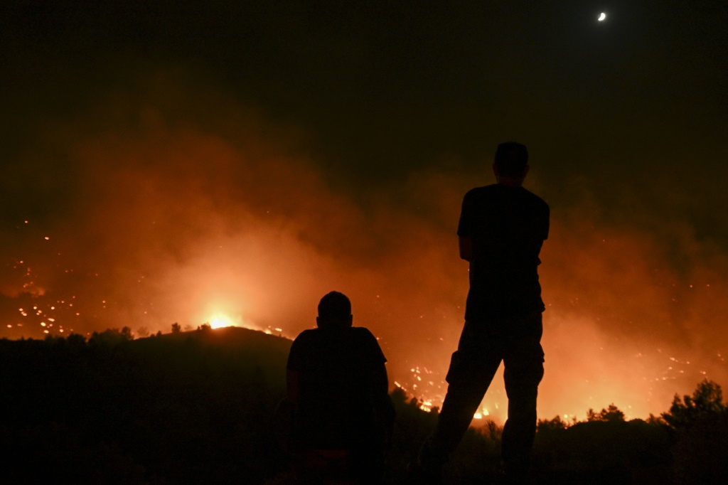 Thousands more evacuated as Greece battles wildfires