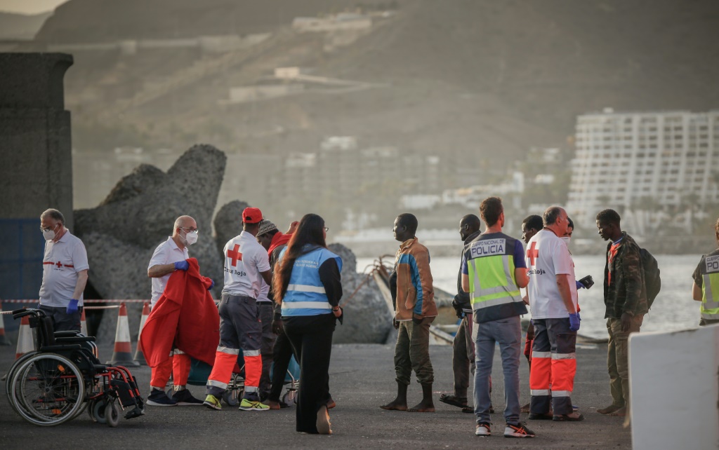 One dead, scores rescued from migrant boat off Canary Isles