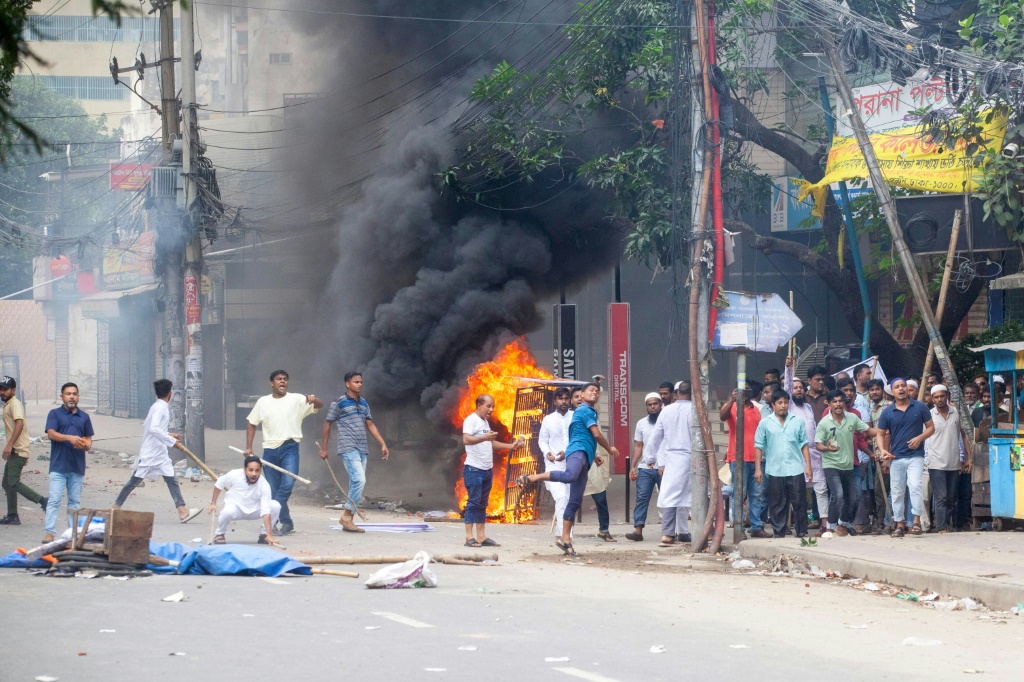 Bangladesh imposes curfew, calls in military after deadly unrest