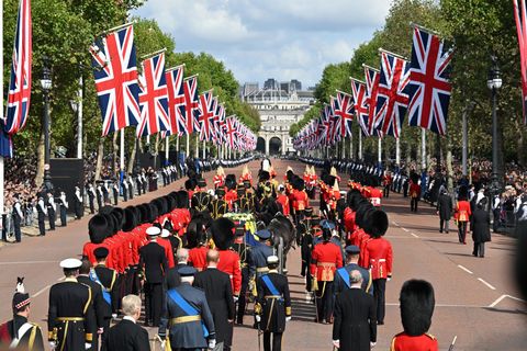 Royal Family walk down The Mall behind Queen’s coffin